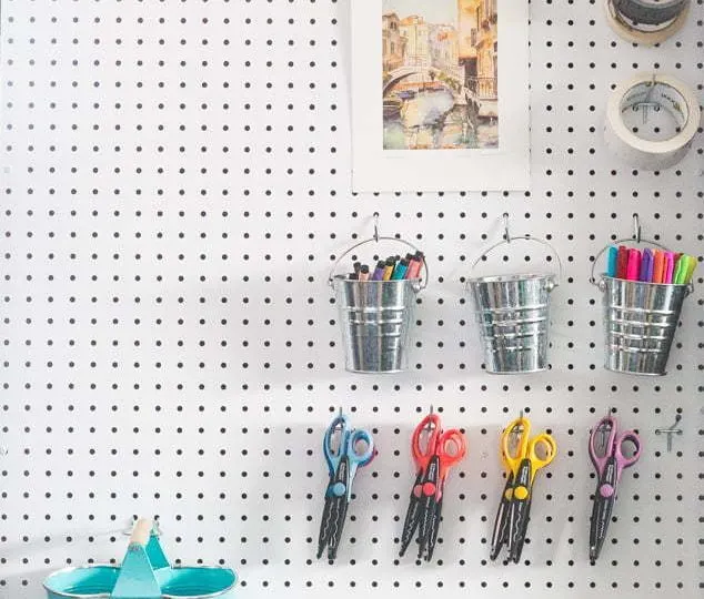 Hide a pipe | pegboard in craftroom | how to hang a pegboard | DIY | Hooks on pegboards