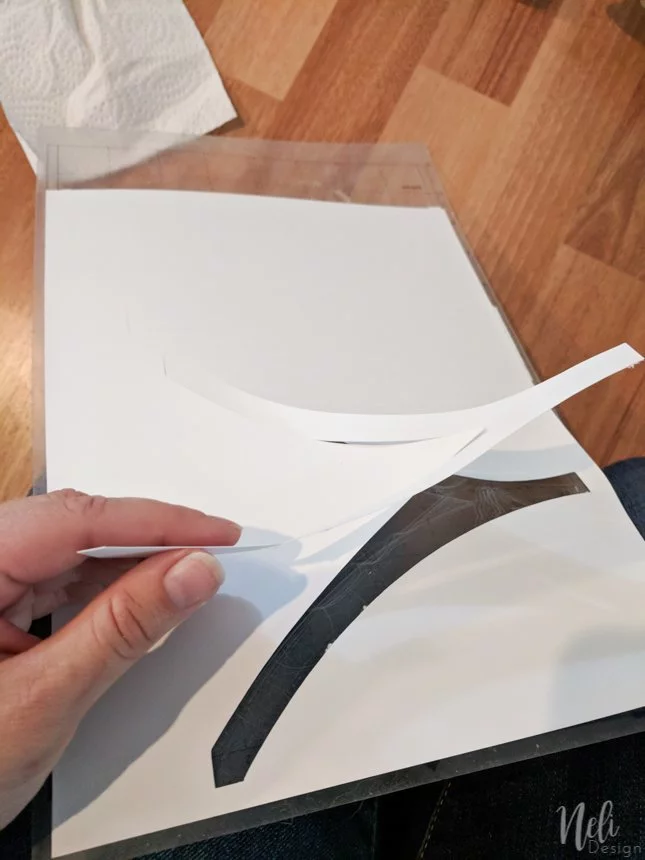 Removing the pattern cut with the Cricut or Silhouette.