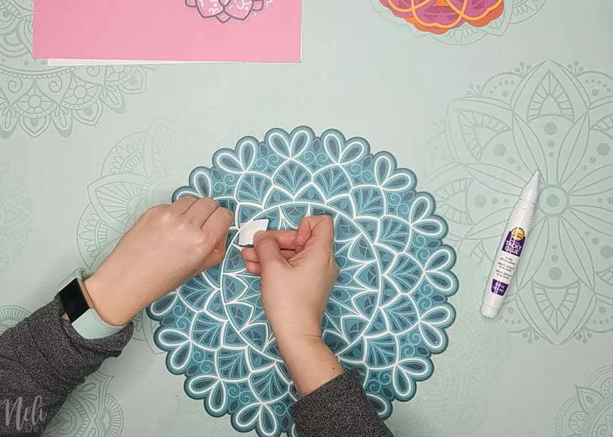 Adding glue to the 3D layered mandalas made with the free SVG files
