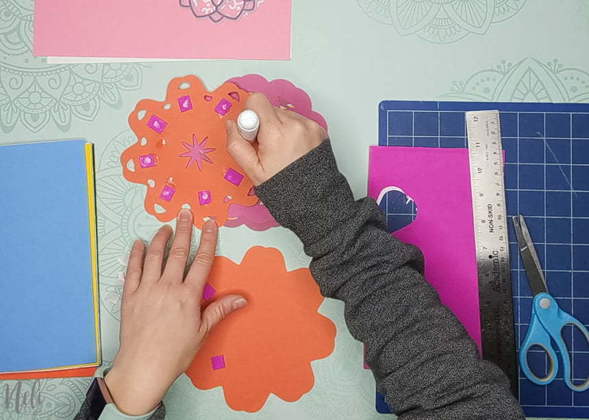 Adding foam to make the 3D layered mandalas made with the free SVG files