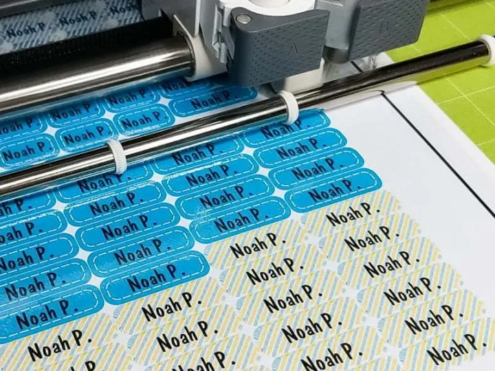 Cricut machine cutting stickers made with Printable vinyl