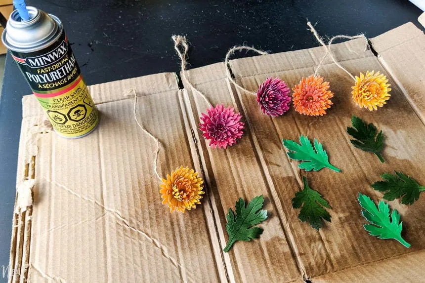 DIY Chrysanthemum paper flowers sprayed with Minwax polyurethane