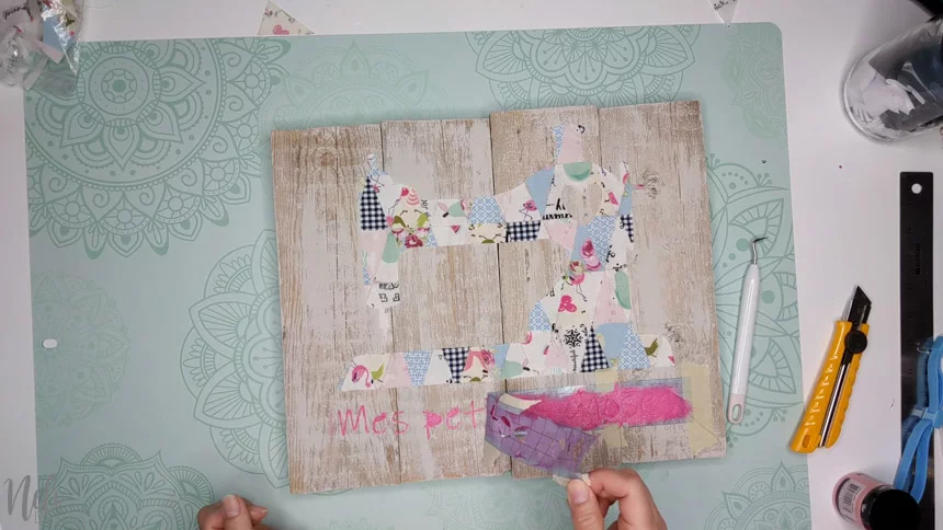 Remove the stencil to make the letters from the frame with the fabric scraps.