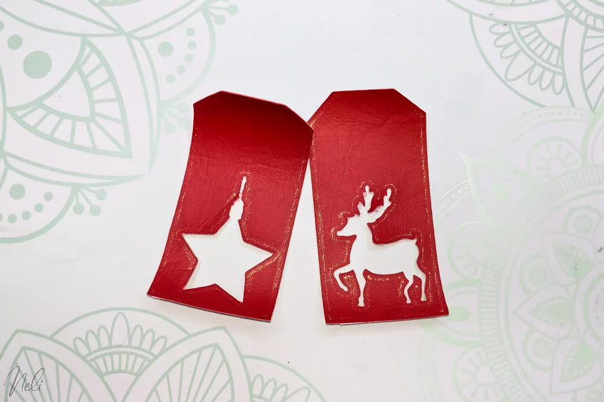 2 Christmas labels made with Foil tip on faux leather