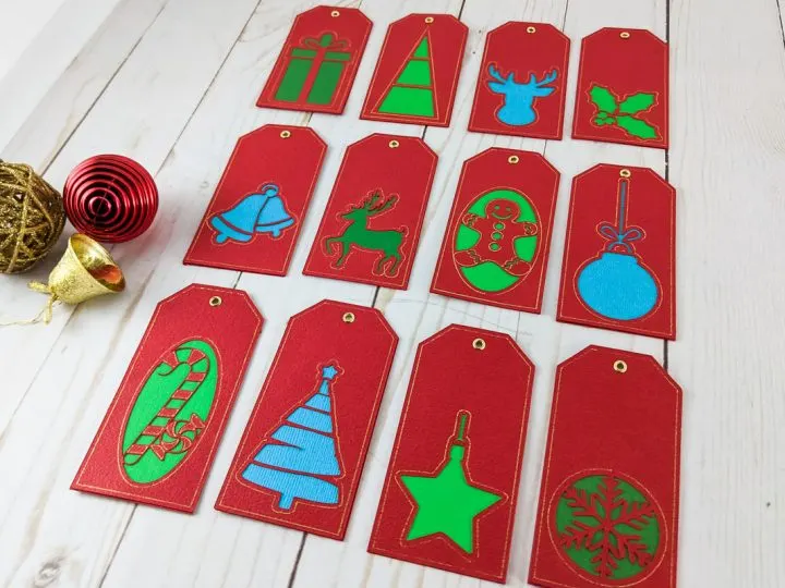 12 Christmas tags made with Cricut Foil tip